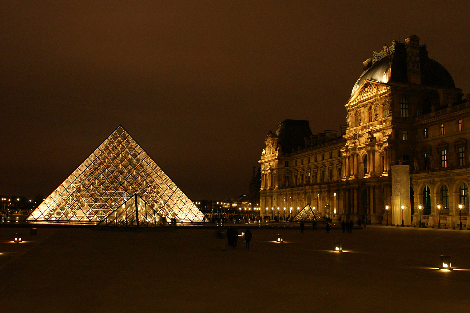 The Louvre by night in Paris